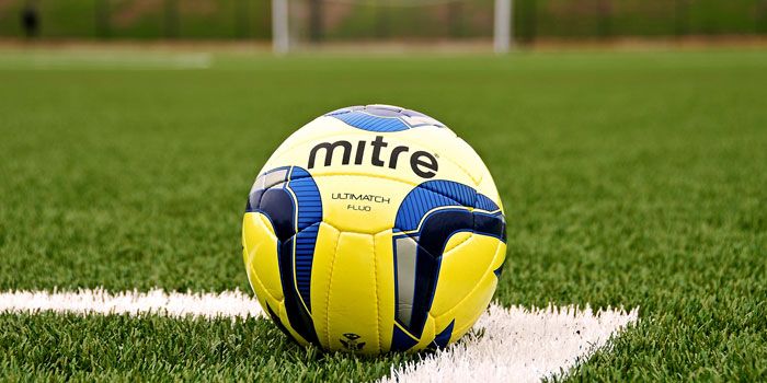 Mitre ball on football pitch